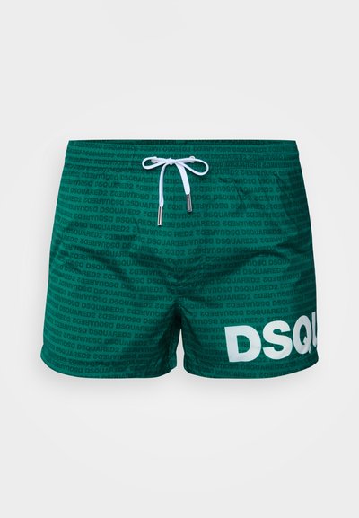 Πράσινα μαγιό με υφή που απεικονίζει λογότυπα "DSQUARED2". Διαθέτει άσπρο κορδόνι και ένα μεγάλο άσπρο λογότυπο στη μία πλευρά.