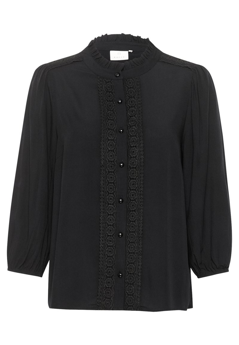 Black blouse with a high neck and ruffled trim, featuring a central lace panel and black buttons down the front, puffed sleeves, and a soft texture.