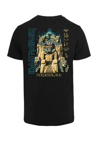 Zwarte katoen t-shirt met een grafische print van een farao die zit met Egyptische symbolen, accenten in blauw en geel, gelabeld "Iron Maiden Powerslave."