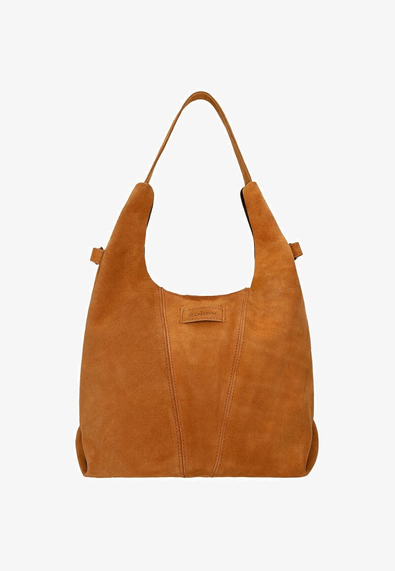 Torebka z brązowego zamszu w strukturze hobo, z szerokim, miękkim uchwytem i wyraźnym szwem centralnym. Teksturowane, matowe wykończenie.