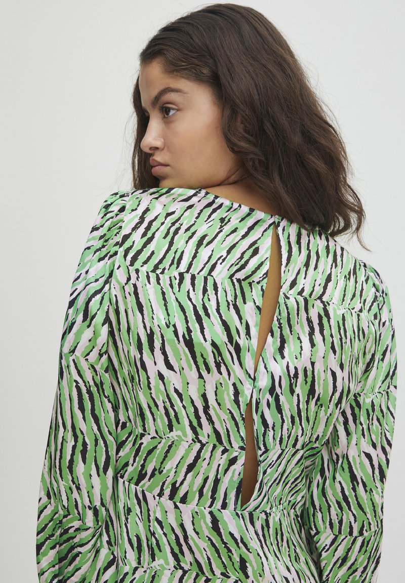 lime green zebra print dress Zamora Bodycon Dress in Classic Zebra Lime main image 1