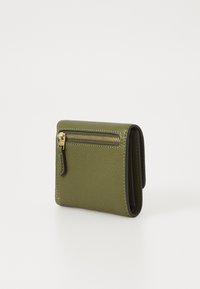 Green leather wallet with a textured finish, featuring a gold zipper and contrasting black accents, in a compact rectangular shape.