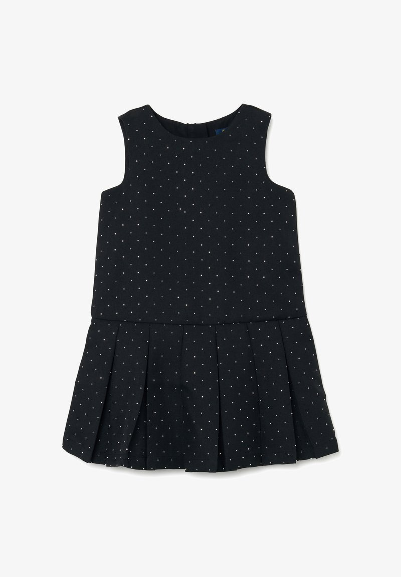 Vestido negro sin mangas con un corsé ajustado y falda plisada, con lunares plateados y cierre de cremallera en la parte posterior. Textura de tela suave.