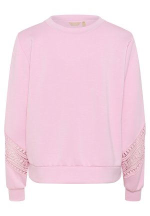 Roza hudica iz mehkega materiala, z osnovnimi čipkastimi detajli na rokavih in okroglim izrezom. Oblikovana z rebrastima manšetama in robom.