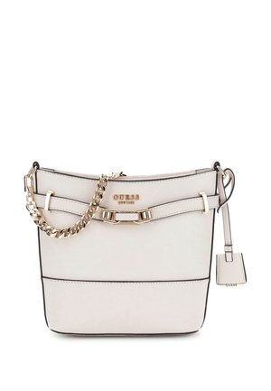 White leather Guess handbag with gold chain strap, decorative gold buckle, and small attached tag on a white background.