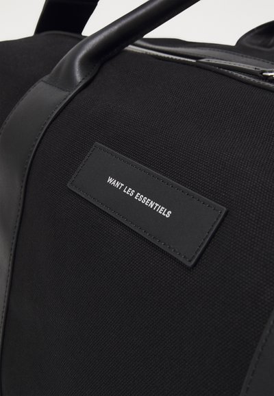 WANT Les Essentiels KELOWNA WEEKENDER UNISEX - Utazótáska - black