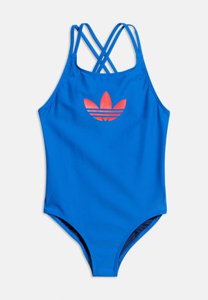 Sinine üheosaline ujumistrikoo ristikujuliste rihmadega ja punase Adidas trefoiliga, mis asub rinnal keskel.