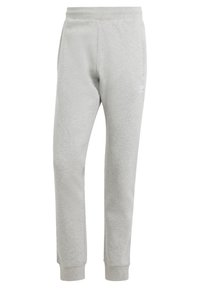 Grå sweatpants i mjukt material med en tapered design, elastisk midja, sidofickor och en vit logotyp på vänster höft.