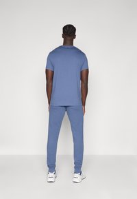 Björn Borg ESSENTIAL - Jogginghose - vintage indigo