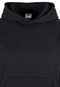 Sudadera negra con capucha, bolsillo tipo canguro delantero y etiqueta "Urban Classics" en el interior del cuello, talla XS.