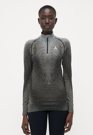 Maglia a maniche lunghe e colletto alto in tessuto grigio metallizzato con zip. Presenta una finitura texturizzata e luccicante e cuciture a contrasto.