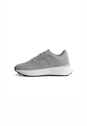 Gray athletic shoe made of suede with a smooth, textured surface. Features a white midsole and black outsole, with lace-up closure.