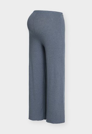 Bordázott széles szárú nadrág puha kék anyagból, rugalmas derékrésszel és áramló sziluettel, amely végig láthatóan texturált.