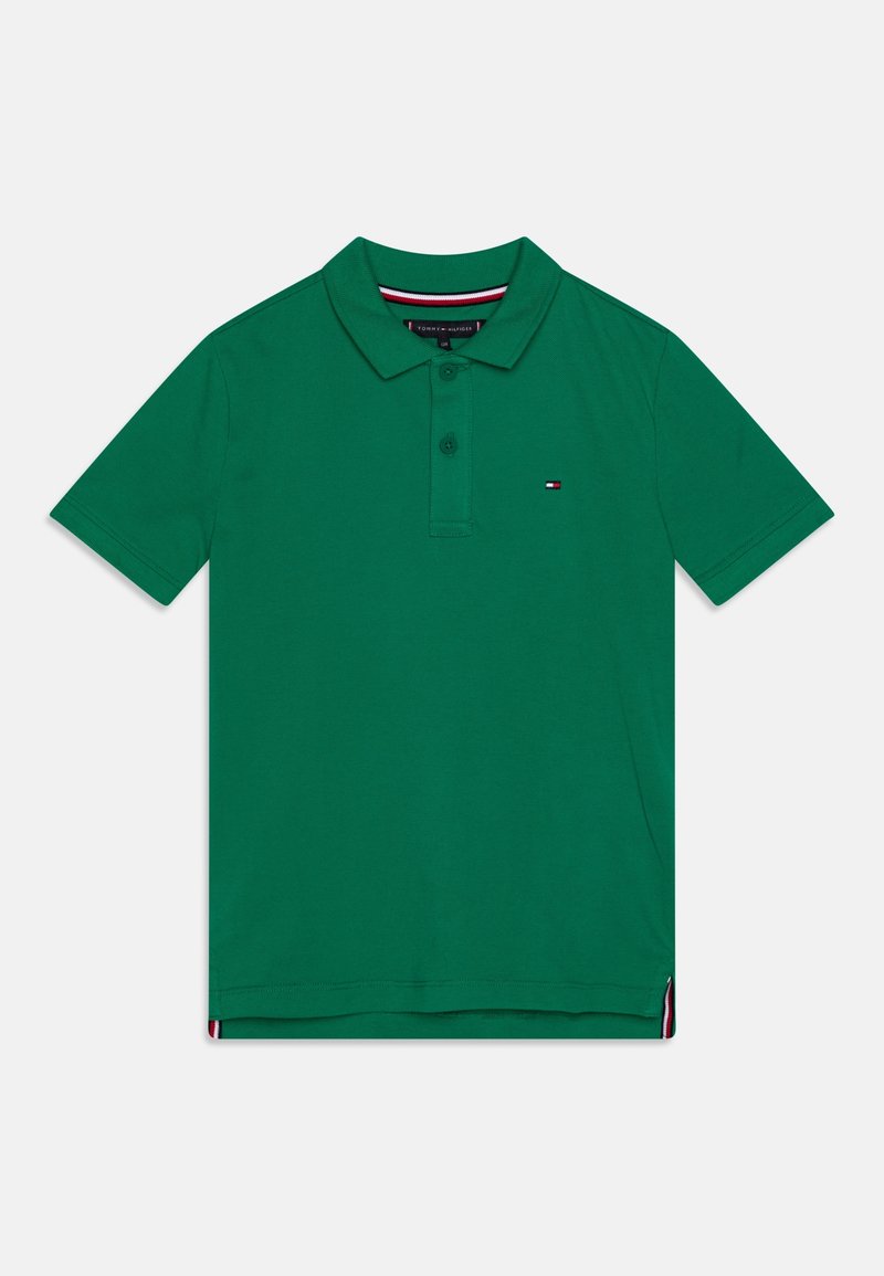 Polo vert à manches courtes avec patte à deux boutons et petit logo drapeau Tommy Hilfiger sur la poitrine gauche.