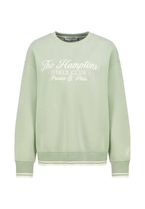 Light green sweatshirt with a crew neckline, ribbed cuffs, and hem. Features white embroidered text: "The Hamptons Girls Club Prosecco & Petals."