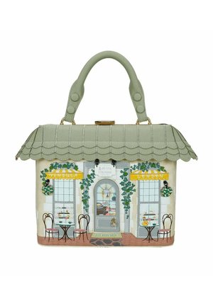 Borsa a mano a forma di vetrina di un caffè con tetto verde smerlato, tavoli, sedie, tende gialle e vigneti attorno alla porta e alle finestre.