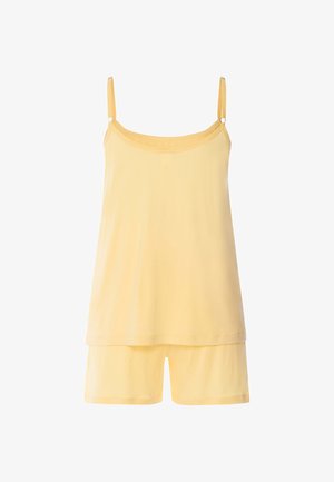 Top caraco jaune sans manches avec bretelles réglables, assorti à un short ample.