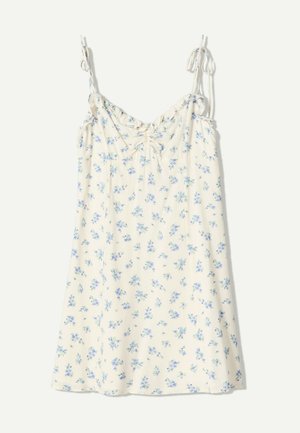 Rochie din satin cu print floral în crem deschis, împodobită cu flori albastre. Dispune de bretele subțiri ajustabile și detalii plisate la bust.
