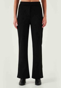 REGULAR FIT - Trousers - black