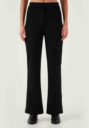 REGULAR FIT - Housut - black