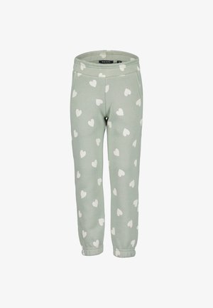 Lysegrønne børnesweatpants med hvide hjerteprints, elastisk taljebånd, sidelommer og manchetter ved anklerne.
