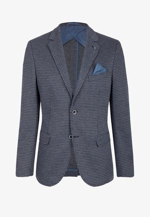 Navy patterned blazer with a textured fabric, two buttons, and flap pockets. Features a contrasting blue inner lining and pocket square.