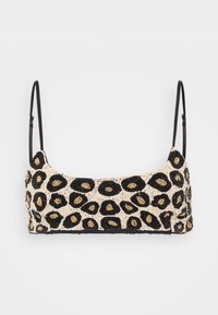 Perlekjole med leopardmønster i svart, gull og beige perler. Den har tynne, justerbare svarte stropper.