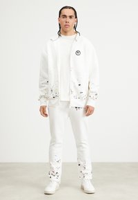 Carlo Colucci - UNISEX - Tracksuit bottoms - weiß Thumbnail Image 1