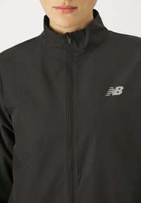 New Balance Veste de running - black