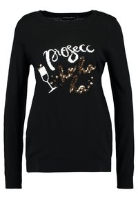 Schwarzer Pullover mit langen Ärmeln und rundem Ausschnitt, der weißen und goldenen Paillettentext mit der Aufschrift "Prosecco" sowie Illustrationen eines Sektglases zeigt.