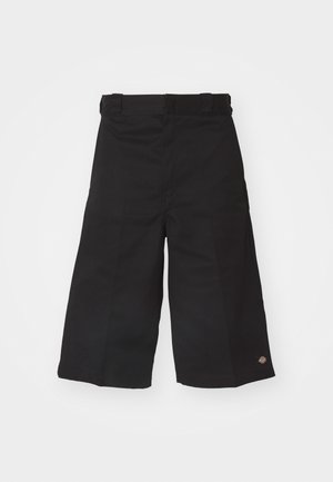 Black wide-leg shorts made of durable fabric. Features a smooth texture and a small logo on the hem. Four belt loops on the waistband.