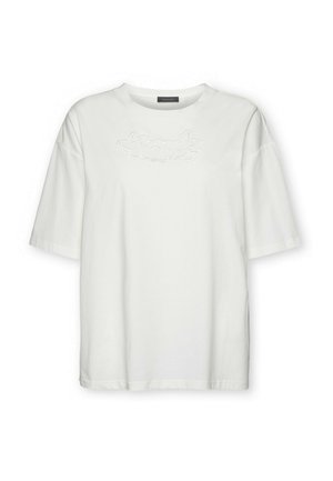 Witte oversized shirt met korte mouwen, ronde halslijn en subtiele witte bloemrijke borduursel over de borst.