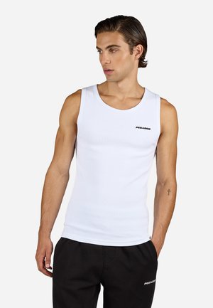 White sleeveless tank top with ribbed texture, feature brand logo in black on the left chest, paired with black sweatpants.