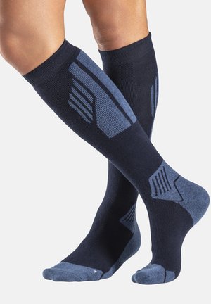 Knee-high socks in dark navy with light blue accents. Features ribbed texture, reinforced heel and toe, and striped pattern on leg area.