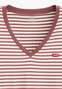 Striped V-neck t-shirt in light pink and burgundy, made of cotton, featuring a small red Levi's logo patch on the left side.