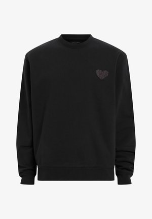 Felpa nera con colletto rotondo, maniche lunghe e un logo a forma di cuore con un motivo testurizzato sul lato sinistro del petto. Tessuto morbido.