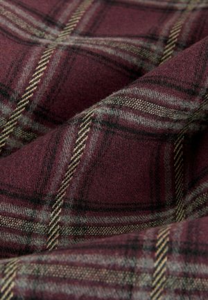Plum plaid fabric featuring gray and beige checks, with a soft, textured finish and visible weave, creating a warm and cozy appearance.