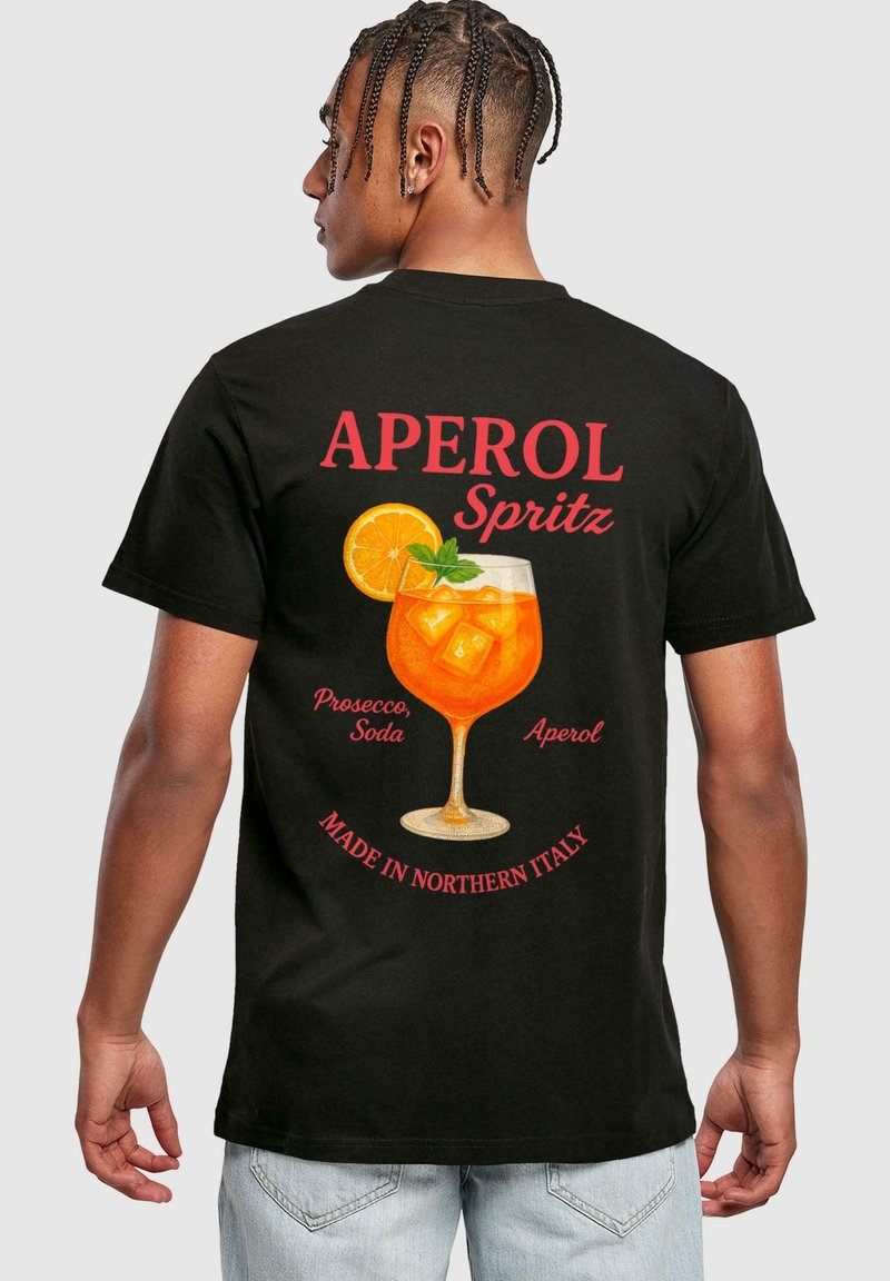 Black cotton t-shirt featuring a graphic of an Aperol Spritz cocktail, with text displaying "APEROL Spritz" and "MADE IN NORTHERN ITALY."