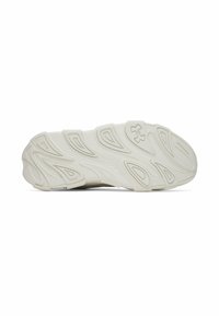White athletic shoe sole with intricate wave patterns and textured surface. Features a prominent logo on the heel.