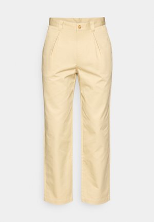 Μπέζ παντελόνι με άνετη εφαρμογή, μπροστινές πιέτες και ενιαία κουμπί. Φτιαγμένο από απαλό ύφασμα με ίσια σχέδιο ποδιού.