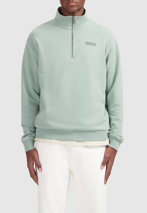 Mintgroene kwart-rits sweatshirt met een staande kraag, met een lichte glans, geribde manchetten en een klein logo op de borst.