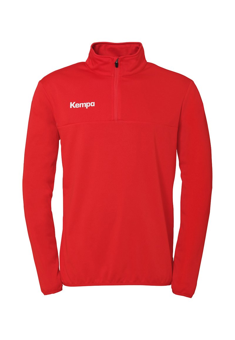 Rode zip-up jas met lange mouwen, gemaakt van een gladde stof. Bevat een hoge kraag en een wit "Kempa" logo op de borst.