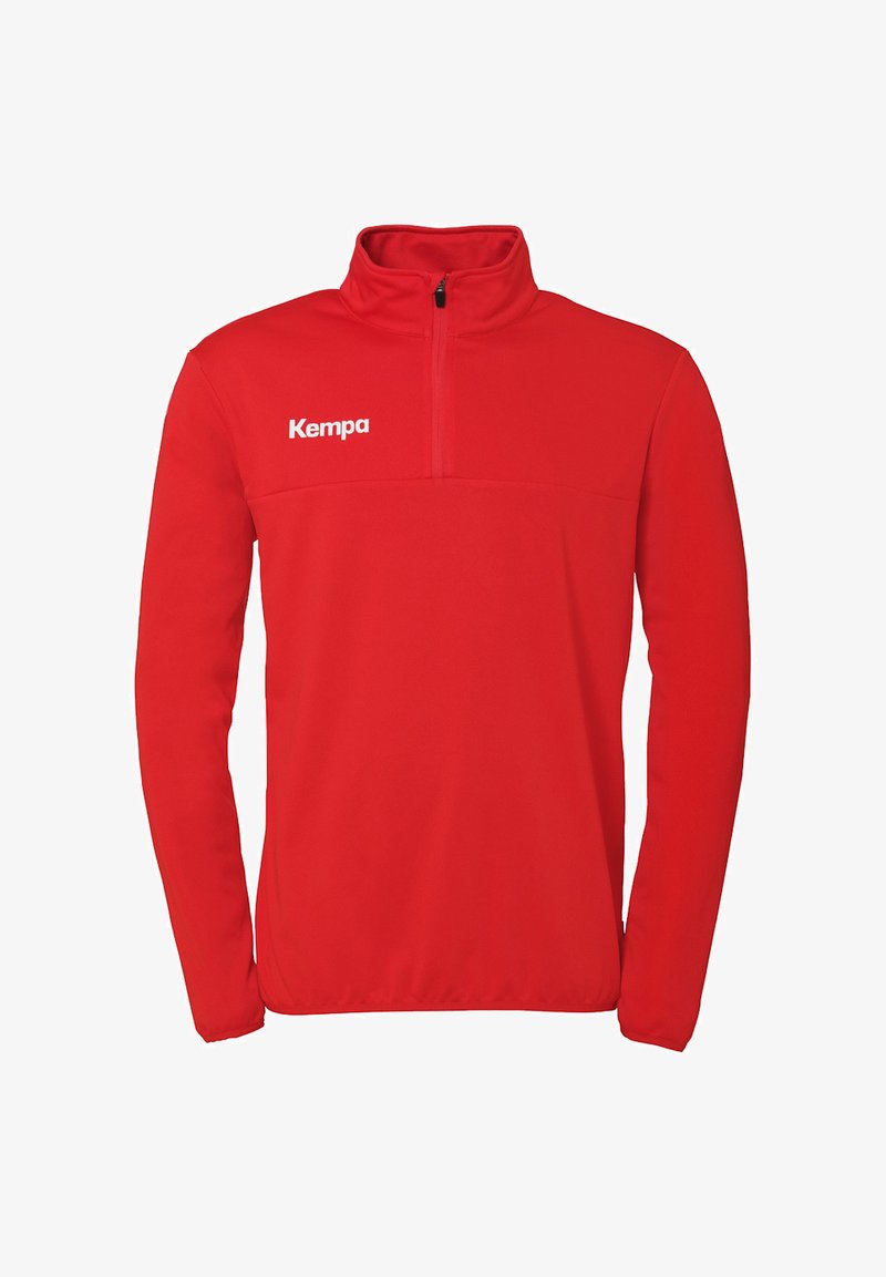 Rode zip-up jas met lange mouwen, gemaakt van een gladde stof. Bevat een hoge kraag en een wit "Kempa" logo op de borst.