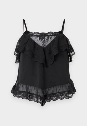 Black camisole featuring layered ruffles and lace accents. Made of lightweight fabric with spaghetti straps and scalloped lace hem.