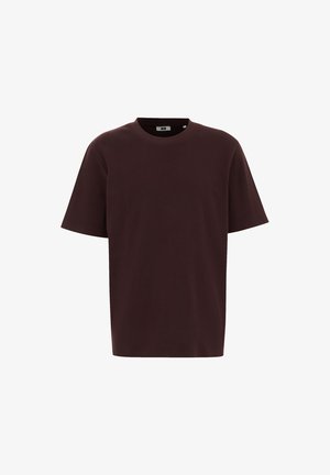 T-shirt a maniche corte in cotone bordeaux scuro. Presenta un colletto rotondo con una vestibilità ampia e nessun motivo o accento visibile.