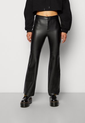 ONLALVIRA FLARED PANT - Trousers - black
