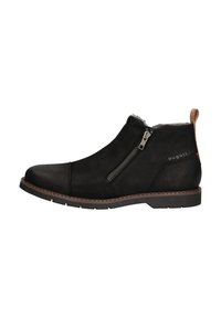 Schwarze Leder-Stiefelette mit seitlichem Reißverschluss, strukturierten Oberflächen, braunem Sohlenstich und einem cognacfarbenen Lederziehband hinten.