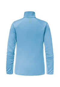 Helles blaues Langarmhemd mit hohem Kragen, das eine feine Textur aufweist und kontrastierende grüne Nähte auf der Rückseite hat.