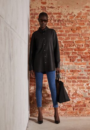 NINA HIGH-RISE ANKLE SKINNY - Calças de ganga de corte skinny - cleanvince