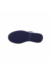 Shoe sole with textured dark blue rubber, featuring a wavy tread pattern. Stamped branding visible in the center of the sole.